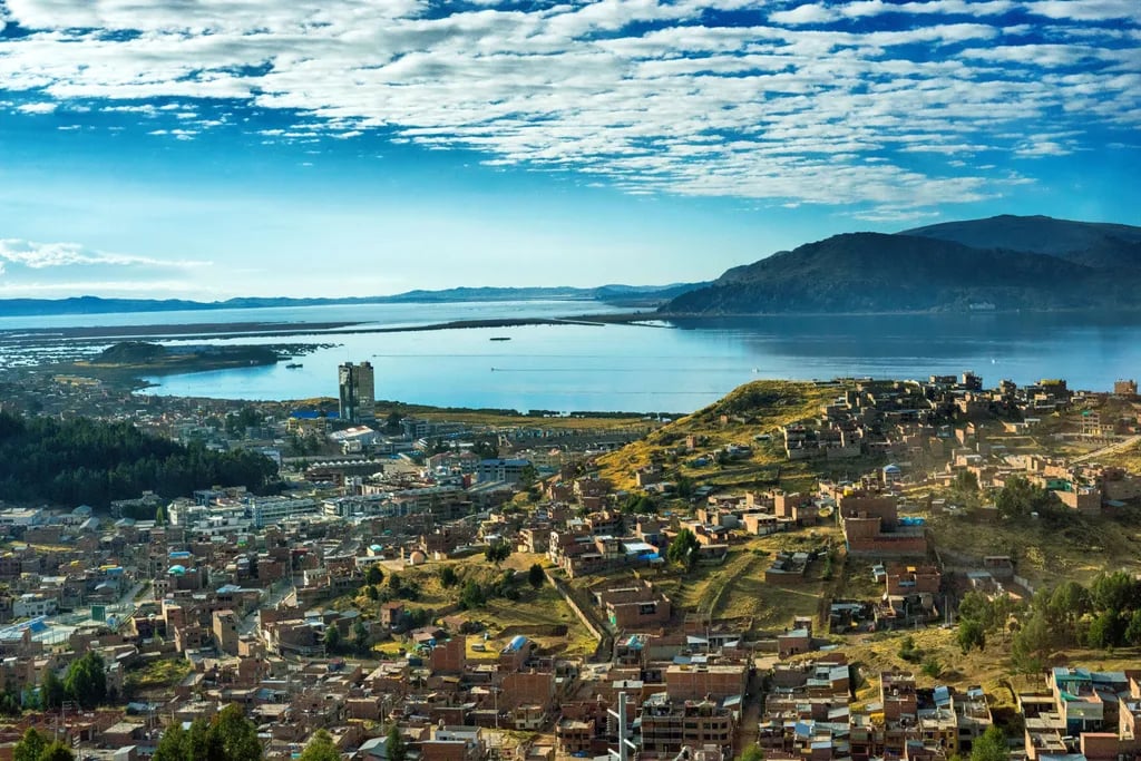 Puno, Peru travel destination - scenic view of Sunrise Over Lake Titicaca from Amantani Island during ideal visiting season