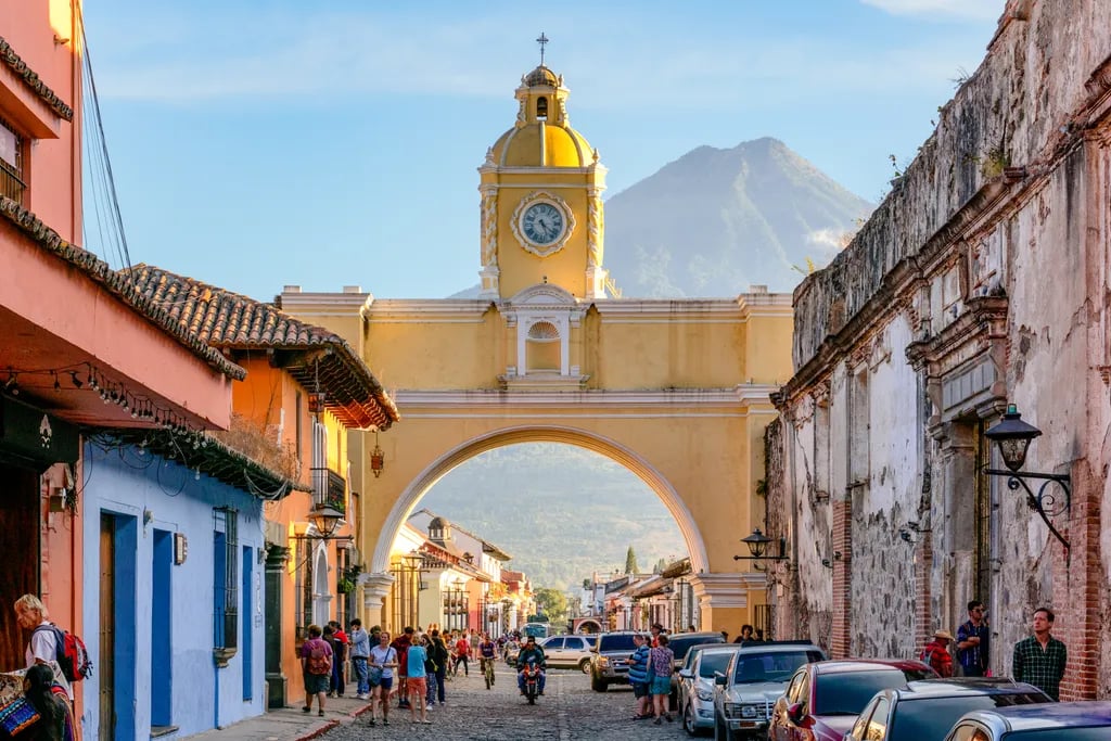 Antigua Guatemala, Guatemala travel destination - scenic view of Sunrise Over the Volcanoes from Cerro de la Cruz during ideal visiting season