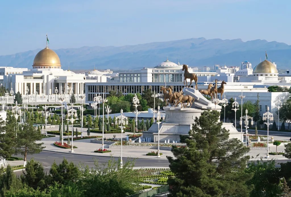 Ashgabat, Turkmenistan travel destination - scenic view of Twilight Spectacle at the Arch of Neutrality during ideal visiting season