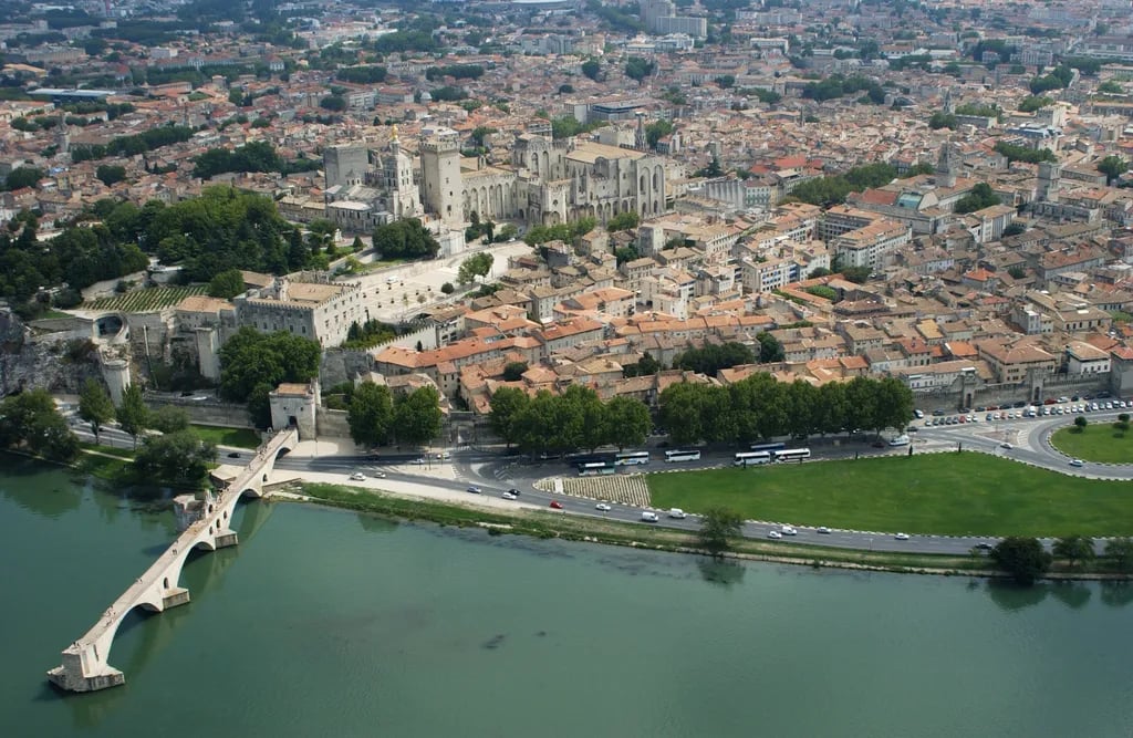 Avignon, France travel destination - scenic view of Palace of the Popes at Dawn during ideal visiting season