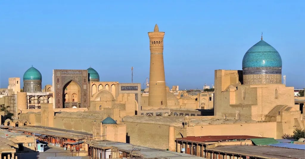 Bukhara, Uzbekistan travel destination - scenic view of Sunrise Over the Poi Kalyan Complex during ideal visiting season