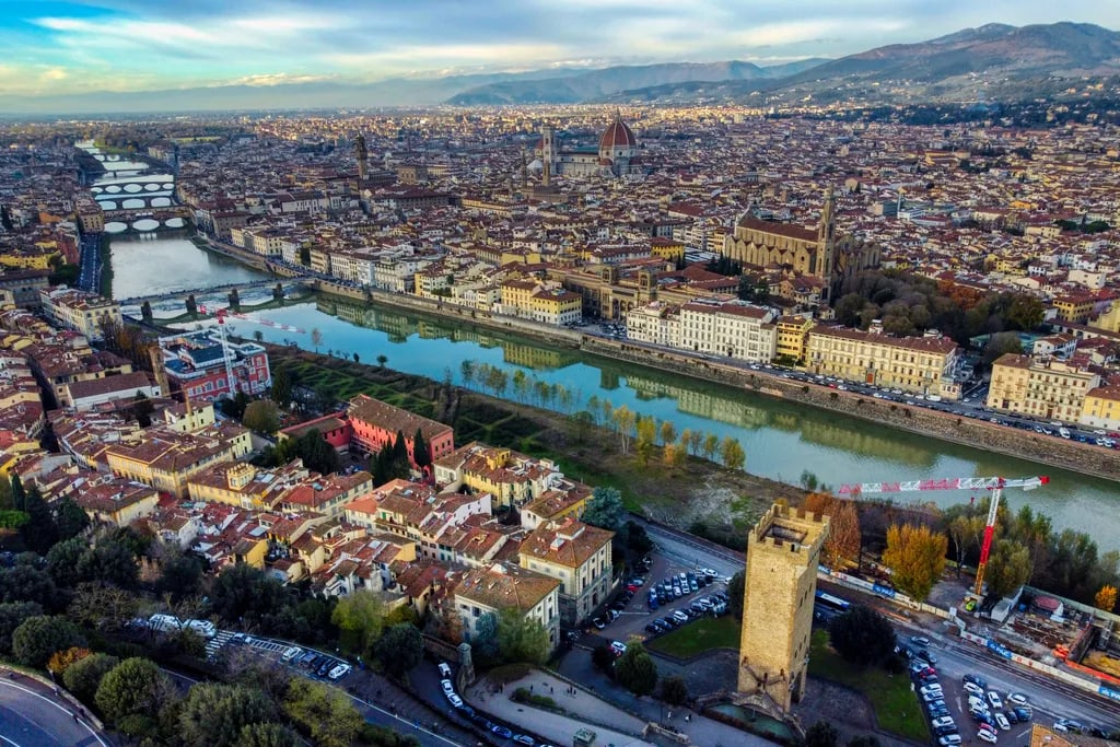 Florence, Italy travel destination - scenic view of Sunrise over the Arno from Piazzale Michelangelo during ideal visiting season