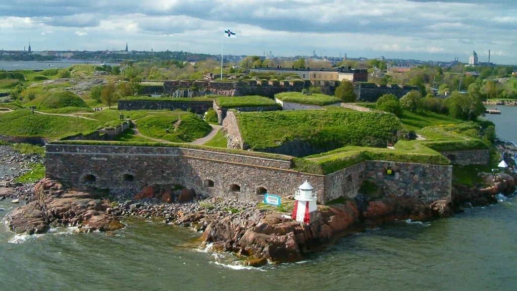 Helsinki, Finland travel destination - scenic view of Sunrise Serenity at Suomenlinna Sea Fortress during ideal visiting season