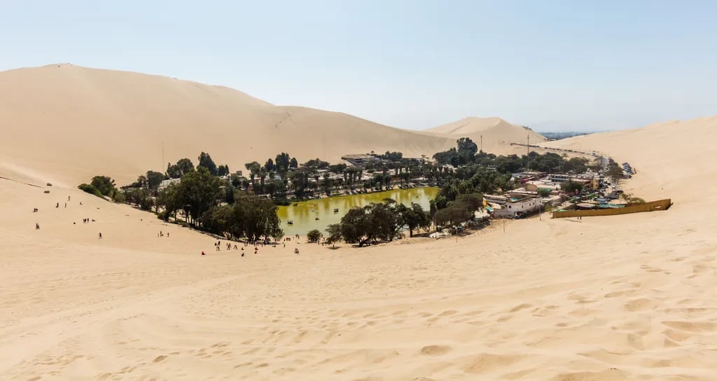 Huacachina, Peru travel destination - scenic view of Sunset Dune Buggy Safari during ideal visiting season