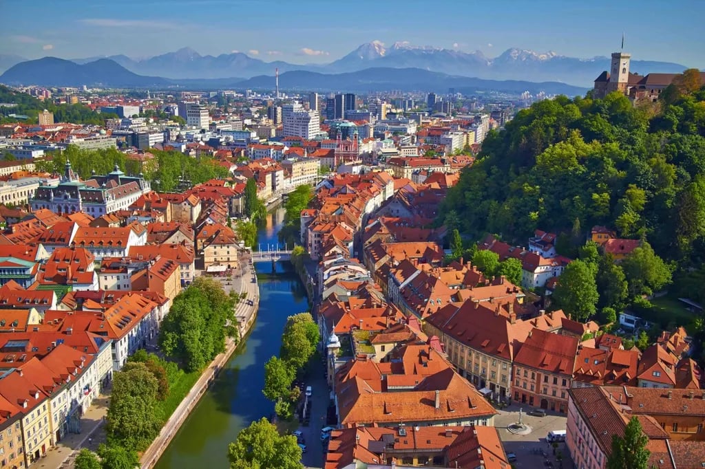 Ljubljana, Slovenia travel destination - scenic view of Glide Along the Ljubljanica River at Dusk during ideal visiting season