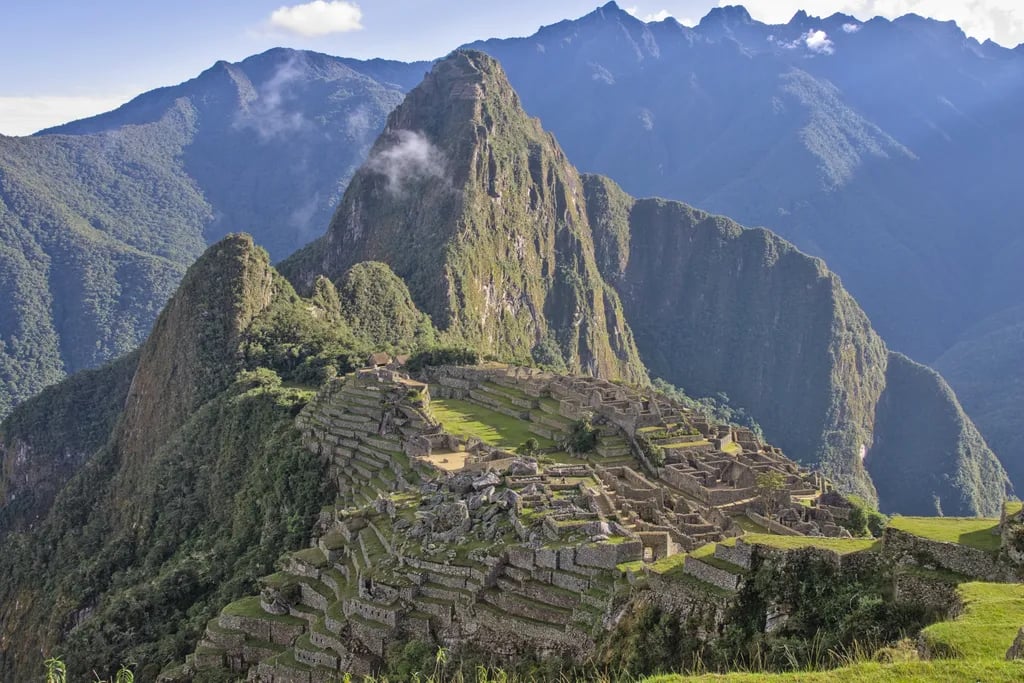 Machu Picchu, Peru travel destination - scenic view of Sunrise Over the Citadel during ideal visiting season