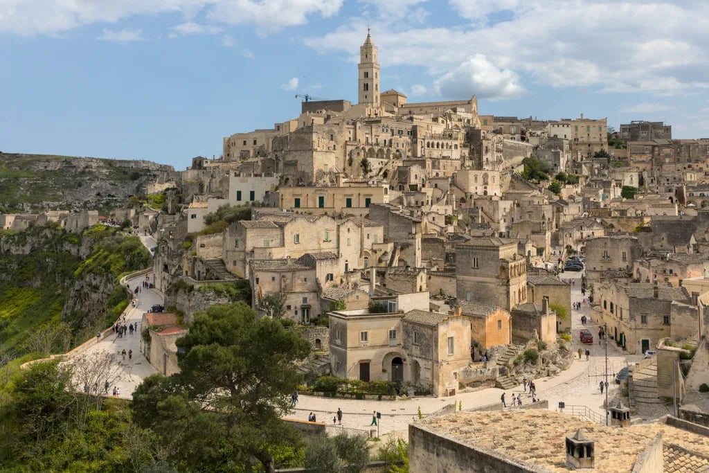 Matera, Italy travel destination - scenic view of Sunrise Over the Sassi during ideal visiting season