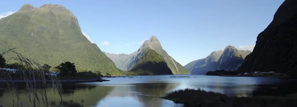 Milford Sound, New Zealand travel destination - scenic view of Kayaking Amongst the Giants during ideal visiting season