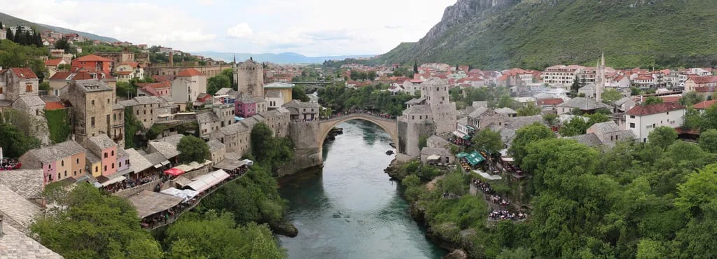 Mostar, Bosnia and Herzegovina travel destination - scenic view of Sunrise Over Stari Most during ideal visiting season