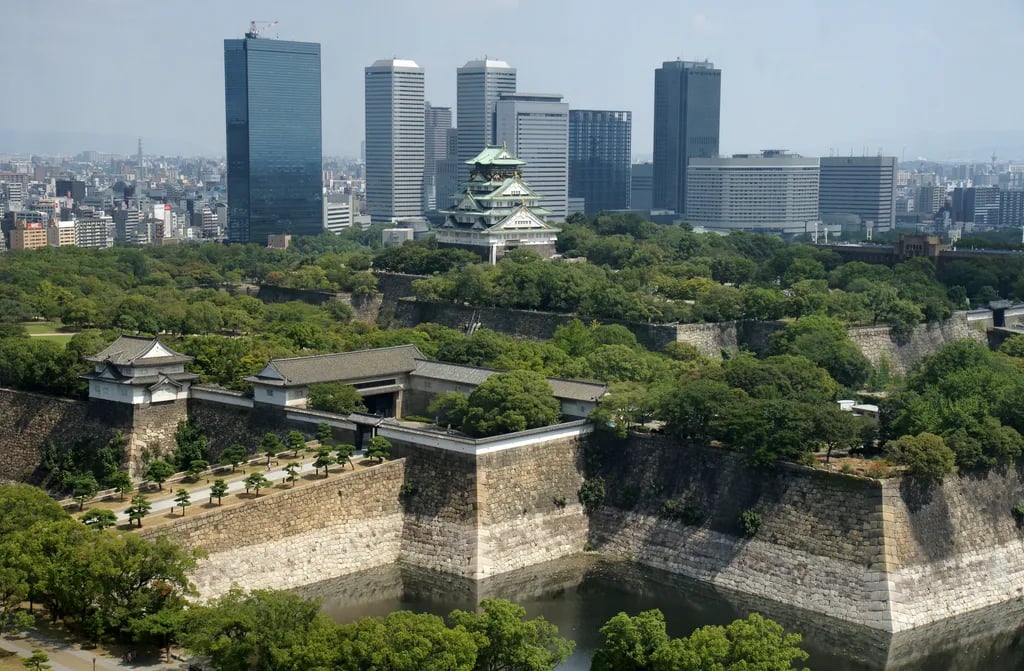 Osaka, Japan travel destination - scenic view of Sunrise Over Osaka Castle's Golden Roof during ideal visiting season