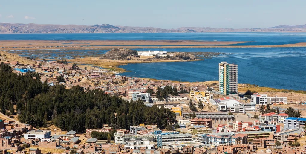 Puno, Peru travel destination - scenic view of Sunrise Over Lake Titicaca from Amantani Island during ideal visiting season